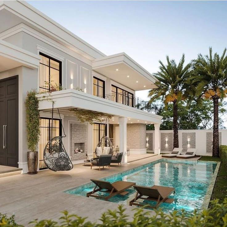 Buy Property in Dubai – Modern luxury villa with private pool, outdoor lounge, and palm trees in an exclusive residential community – AL Zad Real Estate